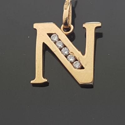 N raidelė