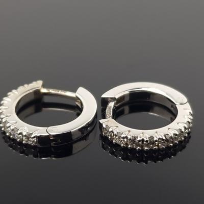 Auksiniai auskarai rinkės su briliantais
