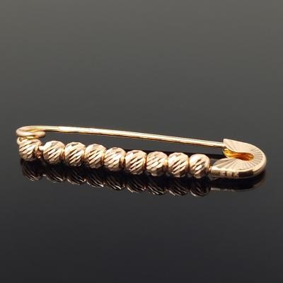 Auksinė sagė žiogelis