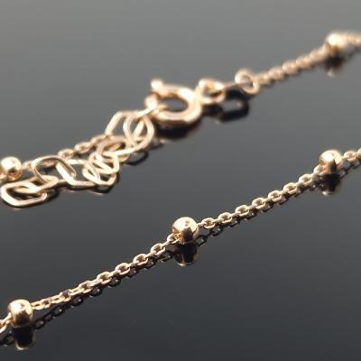 Auksinė grandinėlė su burbuliukais