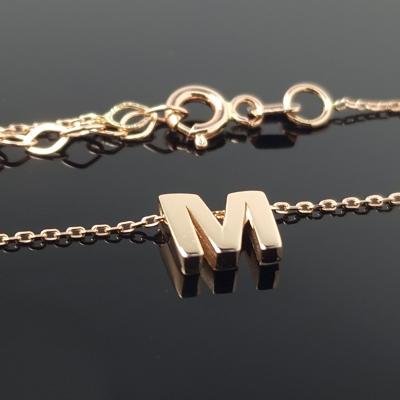 Auksinė grandinėlė su raidele M