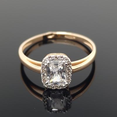 Auksinis žiedas su akmenukais