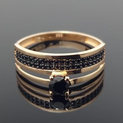 Dvigubas auksinis žiedas su akutėmis