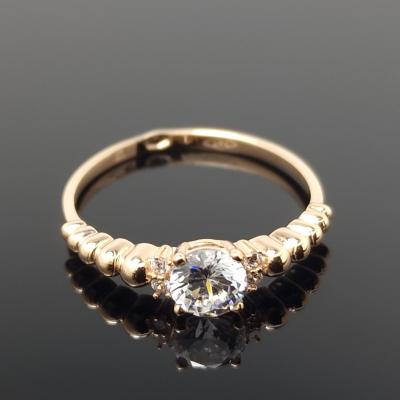 Auksinis žiedas su akutėmis