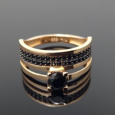 Dvigubas auksinis žiedas su akutėmis