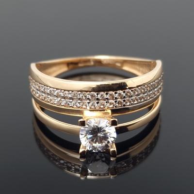 Dvigubas auksinis žiedas su akutėmis