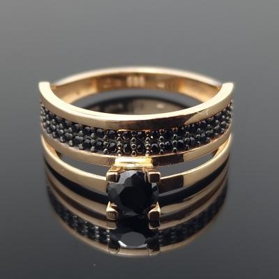 Dvigubas auksinis žiedas su akutėmis