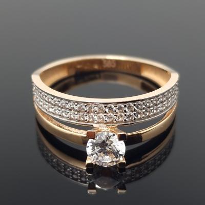 Dvigubas auksinis žiedas su akutėmis