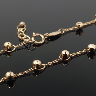 Auksinė grandinėlė ant kojos